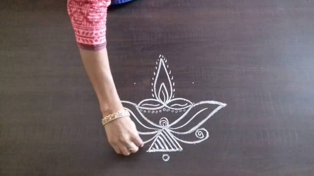 20 Amazing Karthigai Deepam Rangoli to try - Wedandbeyond